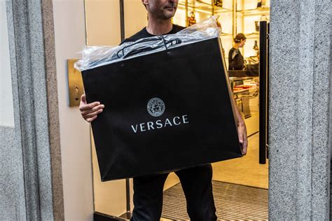 michael kors buys versace|which brands do versace own.